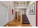 Grand foyer with hardwood floors, staircase, and view to the second floor at 3032 Montclair Se Cir, Smyrna, GA 30080