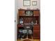 Functional home office with desk, hutch, chair and personal and professional decor at 3032 Montclair Se Cir, Smyrna, GA 30080