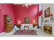 Bright living room featuring a fireplace, high ceilings, and large windows at 3032 Montclair Se Cir, Smyrna, GA 30080