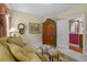 Cozy living room features neutral tones, a plush sofa, and a decorative rug at 3032 Montclair Se Cir, Smyrna, GA 30080