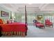 Large primary bedroom featuring a sitting area with plush chairs and bright windows at 3032 Montclair Se Cir, Smyrna, GA 30080