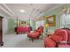 Spacious main bedroom with a four-poster bed, sitting area, and tray ceiling at 3032 Montclair Se Cir, Smyrna, GA 30080