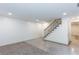 Open basement area with stairs and recessed lighting at 3960 Rocmar Dr, Snellville, GA 30039