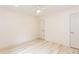 Bright bedroom includes light wood floors, a ceiling fan, and a closet at 3960 Rocmar Dr, Snellville, GA 30039