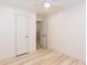 Bright bedroom with white walls, light wood floors and closet at 3960 Rocmar Dr, Snellville, GA 30039