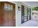 Inviting front entrance with a traditional door, stylish lighting, and charming exterior details at 3960 Rocmar Dr, Snellville, GA 30039