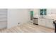 Bright kitchen features stainless appliances, white cabinets, and marble backsplash at 3960 Rocmar Dr, Snellville, GA 30039