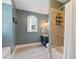 A full bathroom featuring a shower with tile walls and a bathtub at 4224 Dogwood Bend Park, Duluth, GA 30096