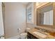 Cozy bathroom features granite countertops, a shower, and a window with shutters at 4224 Dogwood Bend Park, Duluth, GA 30096