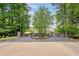 Gated entrance to the community with brick-paved driveway and manicured landscaping at 4224 Dogwood Bend Park, Duluth, GA 30096