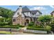 Beautiful home exterior featuring stone accents, manicured landscaping, and inviting entrance at 4224 Dogwood Bend Park, Duluth, GA 30096