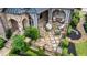 Inviting outdoor patio with stone pavers, seating area, and lush landscaping at 4224 Dogwood Bend Park, Duluth, GA 30096