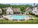 Community pool with lounge chairs and a gazebo, surrounded by manicured lawns at 4224 Dogwood Bend Park, Duluth, GA 30096
