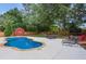 Beautiful backyard with pool, mature trees, privacy fence, a shed and outdoor play area at 657 Polk Nw St, Marietta, GA 30064