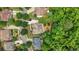 Aerial view showcasing the property's location within a neighborhood with mature trees and landscaping at 702 Crescent Cir, Canton, GA 30115