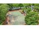 Community basketball court surrounded by lush trees and greenery at 702 Crescent Cir, Canton, GA 30115