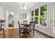Breakfast nook with backyard views, a laundry area, and a charming round table with chairs at 702 Crescent Cir, Canton, GA 30115
