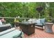 Relaxing deck area with seating around a fire pit, perfect for entertaining at 702 Crescent Cir, Canton, GA 30115