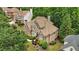 Beautiful brick and stone home with manicured landscaping offering great curb appeal at 702 Crescent Cir, Canton, GA 30115