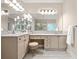 Main bathroom has double vanities and a large mirror at 702 Crescent Cir, Canton, GA 30115