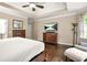 Spacious Main Bedroom has seating and en suite bath at 702 Crescent Cir, Canton, GA 30115