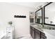 Bathroom with dual sinks, granite countertops, and modern fixtures at 1417 Woodrow Kay Rd, Rockmart, GA 30153