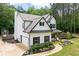 Beautiful two-story home boasting a well-manicured lawn, landscaped flower beds, and attached two car garage at 1417 Woodrow Kay Rd, Rockmart, GA 30153