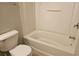 Bathroom featuring tub and shower combination and a single sink vanity at 2137 Meadow Peak Rd, Duluth, GA 30097