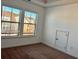 Comfortable bedroom with two windows and neutral-toned walls at 3677 Hidden Valley Cir, Lawrenceville, GA 30044