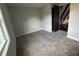Comfortable bedroom with fresh paint, new carpeting, and natural light at 6774 Collier Rd, Riverdale, GA 30296