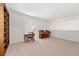 Cozy living room with a piano, desk, and ample space at 3040 Majestic Park Ct, Duluth, GA 30096