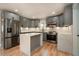 Modern kitchen with stainless steel appliances, granite countertops and ample cabinet space at 3470 Glenwood Rd, Decatur, GA 30032