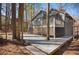 Large, tiered backyard deck creates outdoor living space surrounded by mature trees at 3966 N Indian Nw Cir, Kennesaw, GA 30144