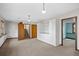 Spacious basement area with storage, carpet, and neutral paint, adaptable for various needs at 3966 N Indian Nw Cir, Kennesaw, GA 30144