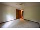 Bedroom showcasing carpet flooring, a ceiling fan, and a closet for storage at 3966 N Indian Nw Cir, Kennesaw, GA 30144