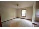 Bedroom with carpet, natural light from window, and ceiling fan for comfort at 3966 N Indian Nw Cir, Kennesaw, GA 30144