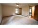 Bright bedroom with neutral carpet, a ceiling fan, and natural light at 3966 N Indian Nw Cir, Kennesaw, GA 30144