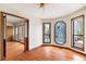 Dining room with hardwood flooring, unique window design and wood trim at 3966 N Indian Nw Cir, Kennesaw, GA 30144