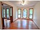 Dining area with hardwood flooring, decorative windows, and a view to another room at 3966 N Indian Nw Cir, Kennesaw, GA 30144