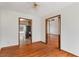 Dining area with hardwood floors that is adjacent to the kitchen and living room at 3966 N Indian Nw Cir, Kennesaw, GA 30144