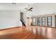 Bright living room featuring hardwood floors, vaulted ceiling, and many windows at 3966 N Indian Nw Cir, Kennesaw, GA 30144