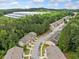 Aerial shot of neighborhood with lush, mature trees and surrounding greenery at 5057 Lower Elm St, Atlanta, GA 30349