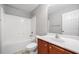Bathroom with vanity and bathtub/shower combination at 5057 Lower Elm St, Atlanta, GA 30349