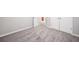 This is a bedroom with gray walls, white trim, a carpeted floor, and a closet at 5057 Lower Elm St, Atlanta, GA 30349