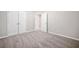 Spacious bedroom with neutral paint and carpet at 5057 Lower Elm St, Atlanta, GA 30349