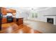 Modern kitchen open to the living room features updated appliances and ample counter space at 5057 Lower Elm St, Atlanta, GA 30349