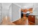 Modern kitchen features wood cabinets, stainless steel appliances, and hardwood floors at 5057 Lower Elm St, Atlanta, GA 30349