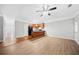 Open floorplan with a kitchen island and hardwood floors at 5057 Lower Elm St, Atlanta, GA 30349