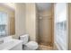 Updated bathroom features tiled shower and modern fixtures at 5422 Timor Trl, Lithonia, GA 30038
