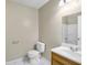 Cozy bathroom features a new toilet and vanity at 5422 Timor Trl, Lithonia, GA 30038